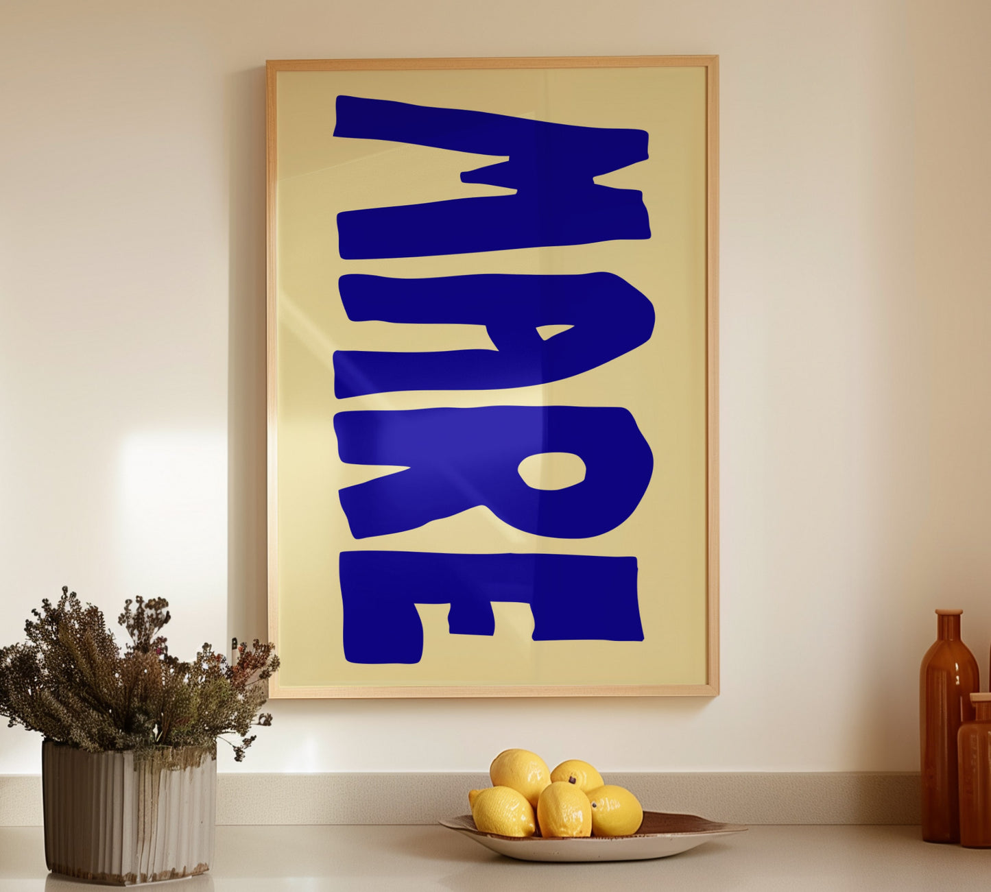 Minimalist kitchen poster with blue handwritten "Mare" on warm beige background.