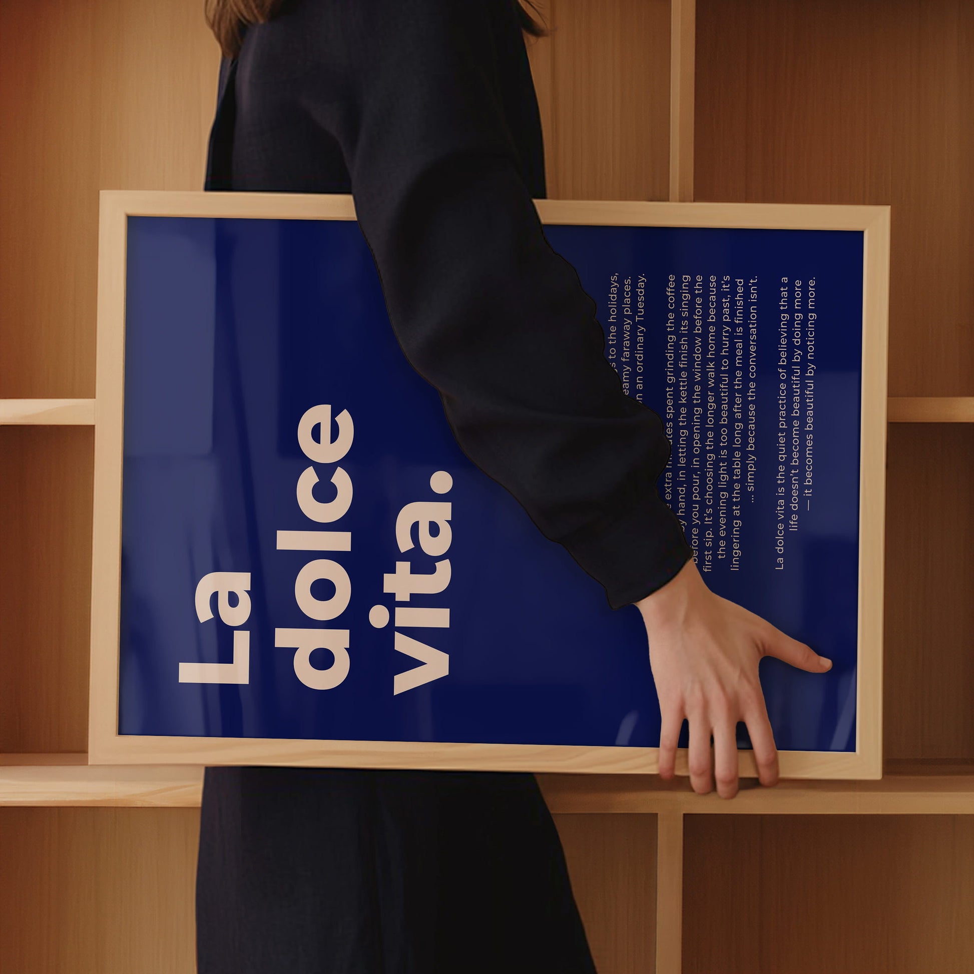 A modern wall print in Yves Klein blue for the dining room as an aesthetic statement about enjoying life with the Italian phrase "La Dolce Vita"