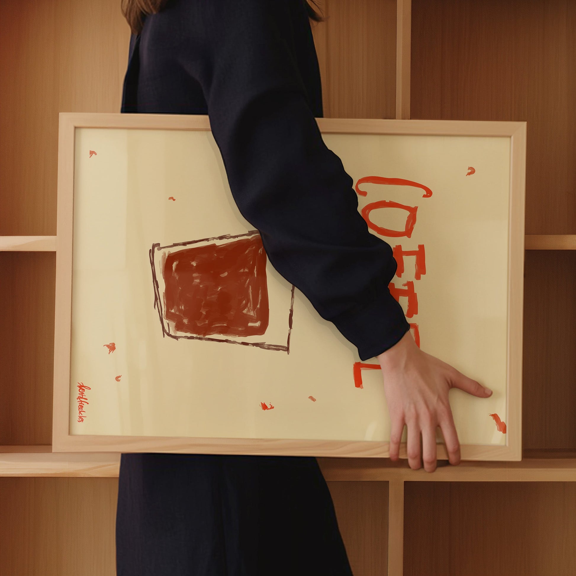 Espresso-inspired minimalist Coffee Cup poster, framed and held by woman in wooden modern kitchen interior.