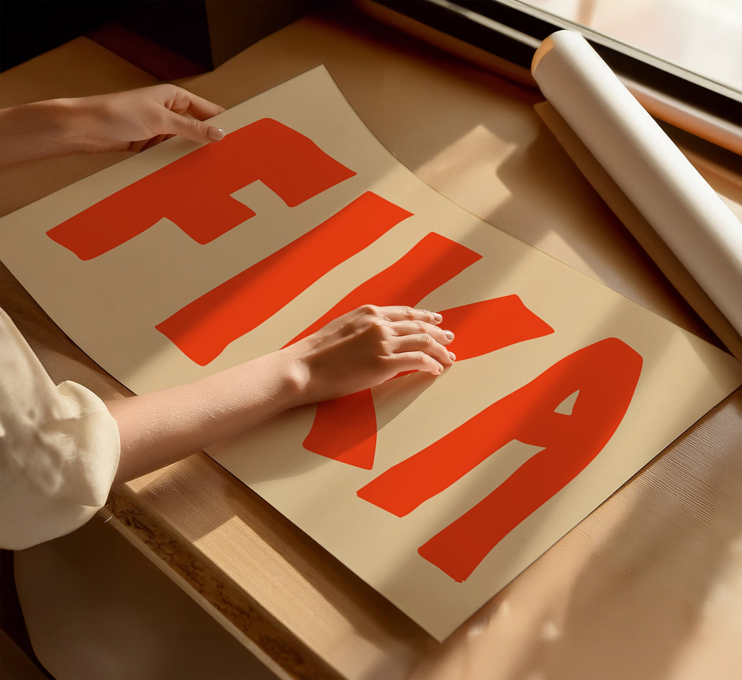 A woman touching a minimalist beige poster with the Swedish word “FIKA", in bold orange letters, on a soft warm beige background.