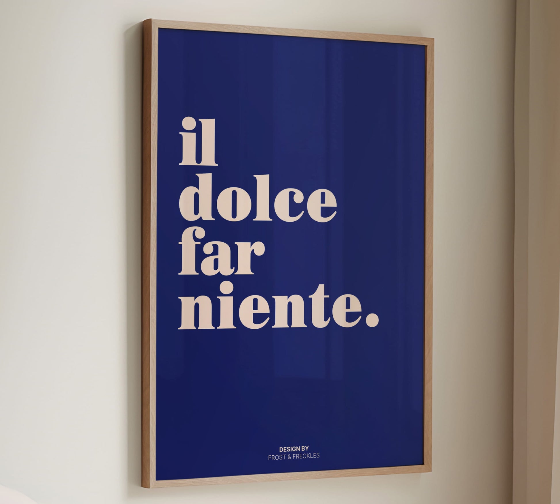 Minimalist typography poster featuring the Italian phrase “il dolce far niente.” in cream white text on a deep blue background as seen in image a2.jpg.