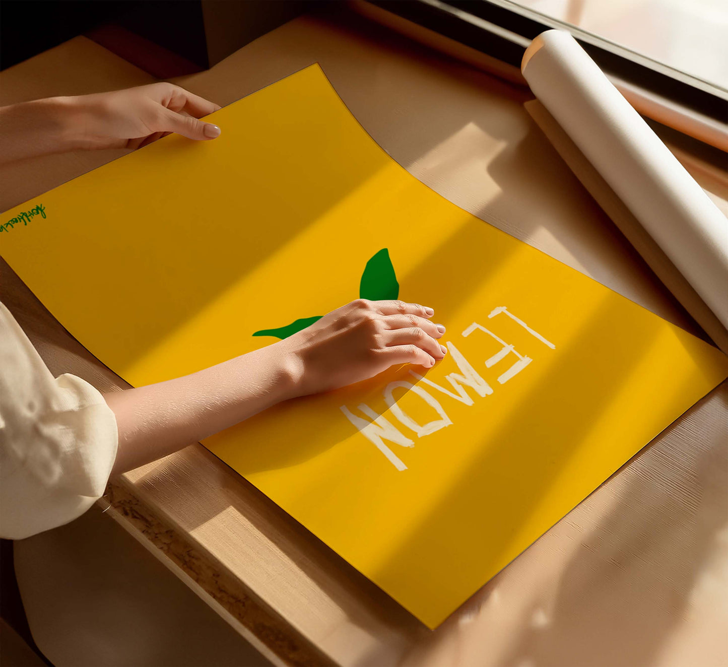 Hand designed and individually printed lemon poster, lying flat on kitchen table before framing.