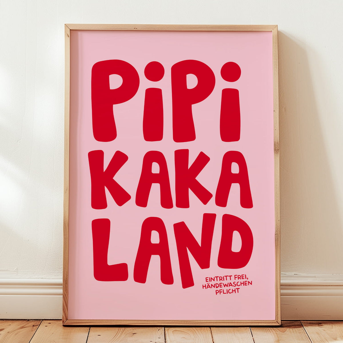 Minimalistisches Typografie-Poster mit dem Schriftzug „Pipi Kaka Land“ in leuchtendem Pink und Rot für das Badezimmer und WC.