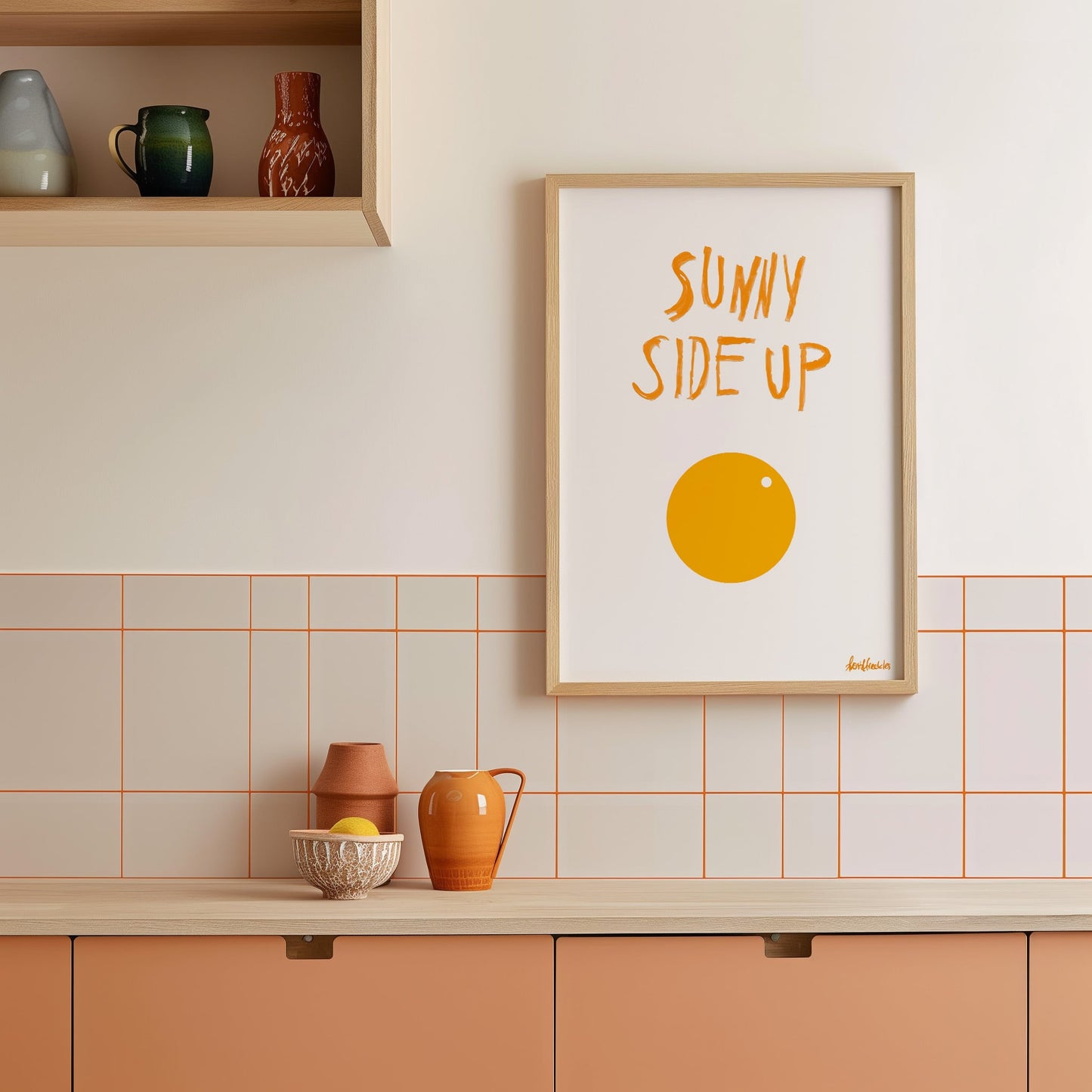 Minimalist egg print framed on wall above counter, boho breakfast-inspired kitchen art.