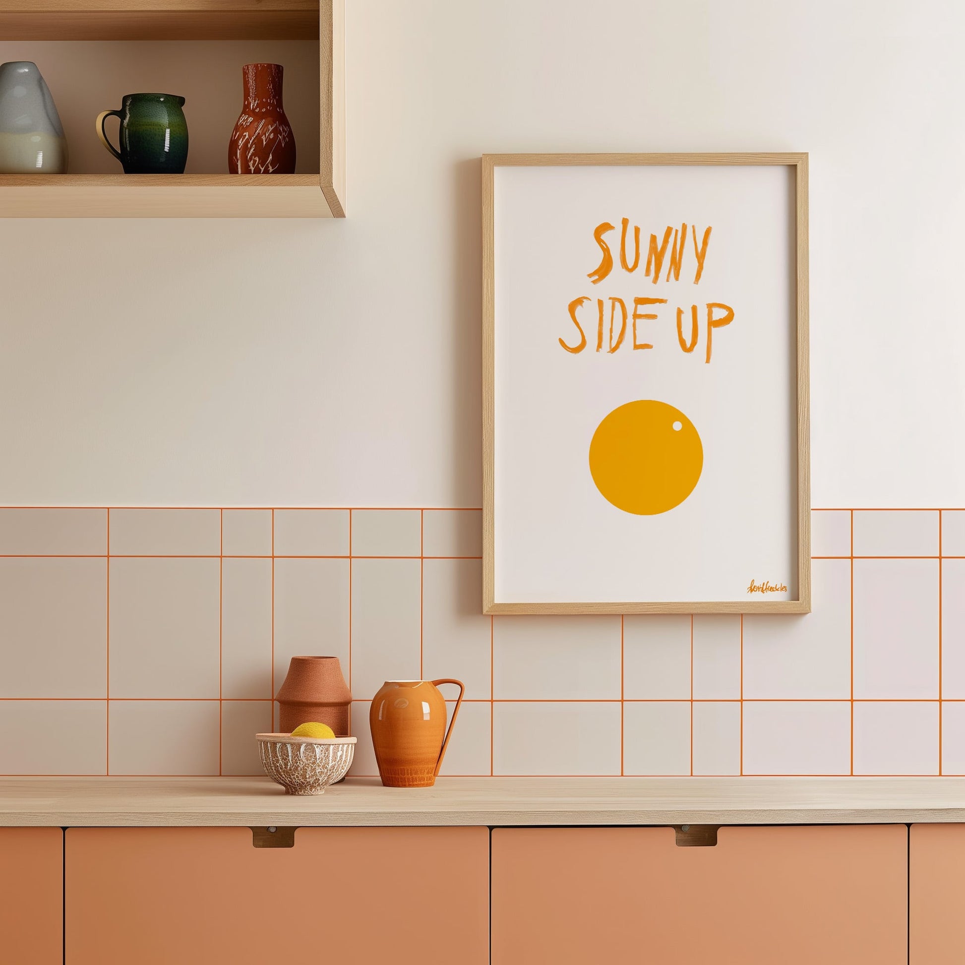 Minimalist egg print framed on wall above counter, boho breakfast-inspired kitchen art.